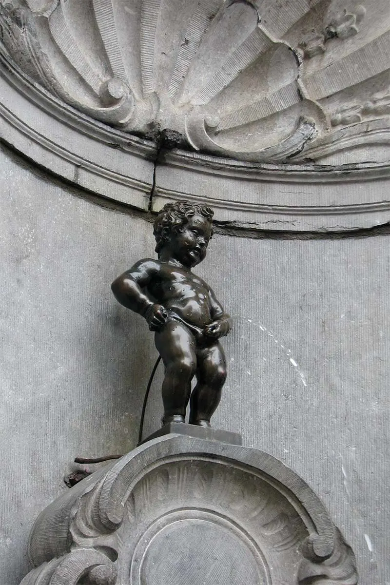 Manneken-Pis peeing boy fountain in Brussels Belgium