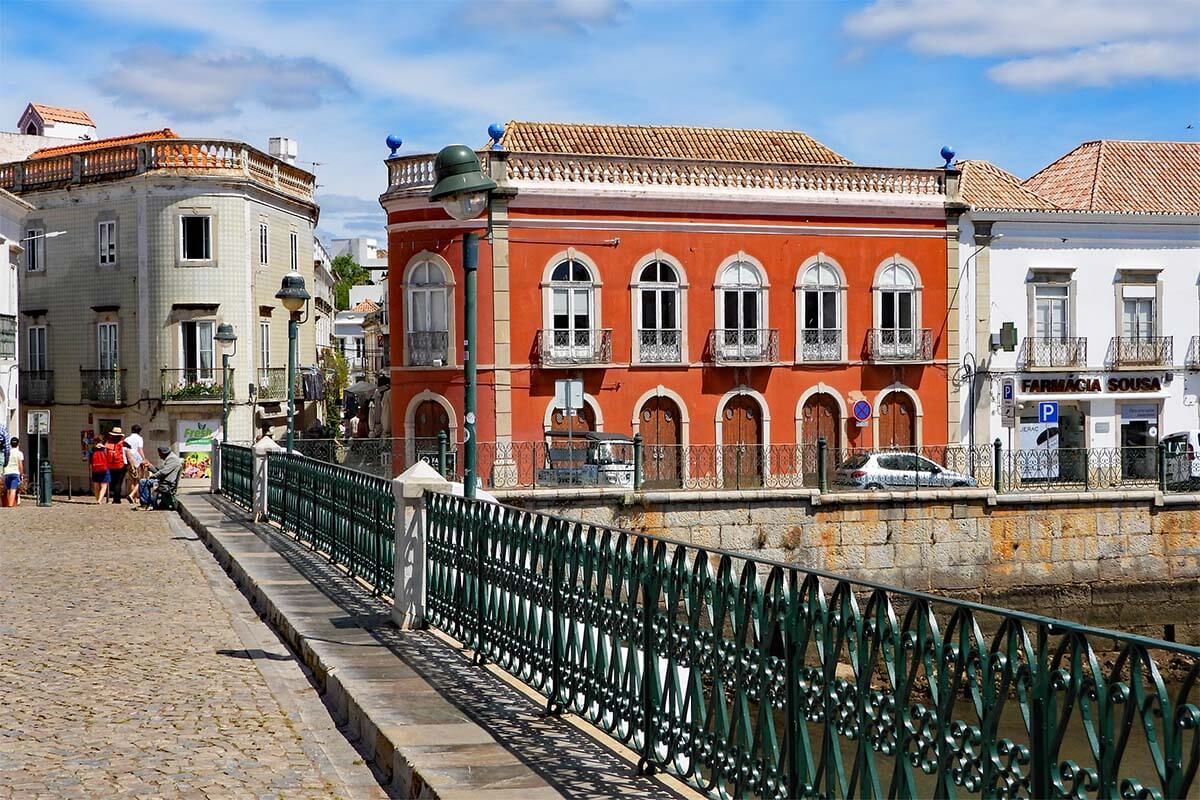 Tavira Roman bridge and colorful buildings in the old town