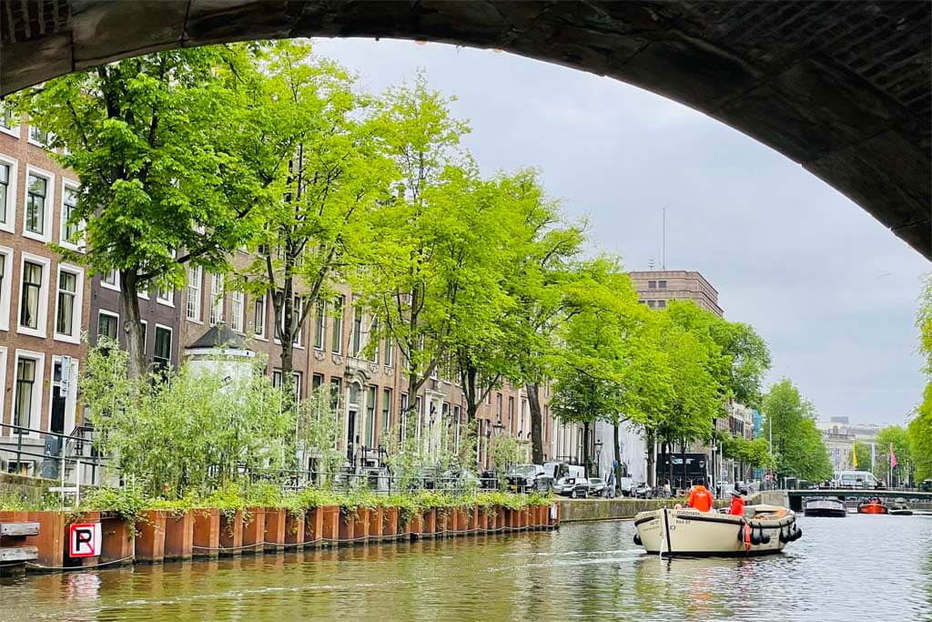 Boat tour on canals in Amsterdam - view from under the bridge