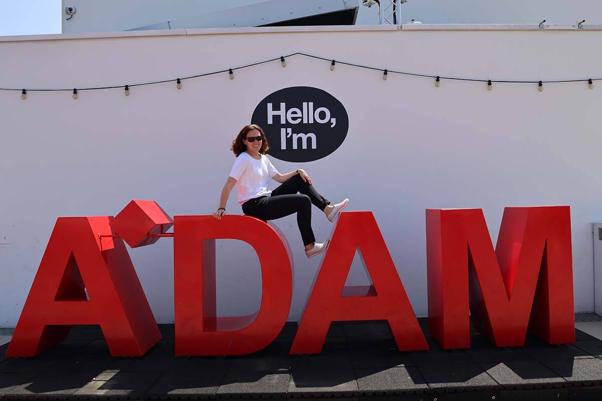 Jurga on A'DAM letters at ADAM Lookout rooftop experience in Amsterdam