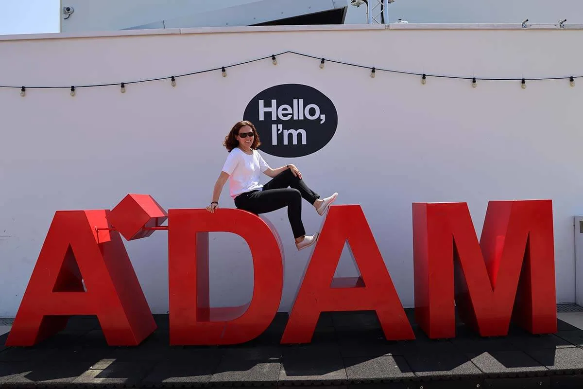 Jurga on A'DAM letters at ADAM Lookout rooftop experience in Amsterdam