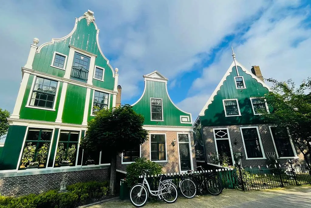 Traditional green wooden houses in the Amsterdam countryside