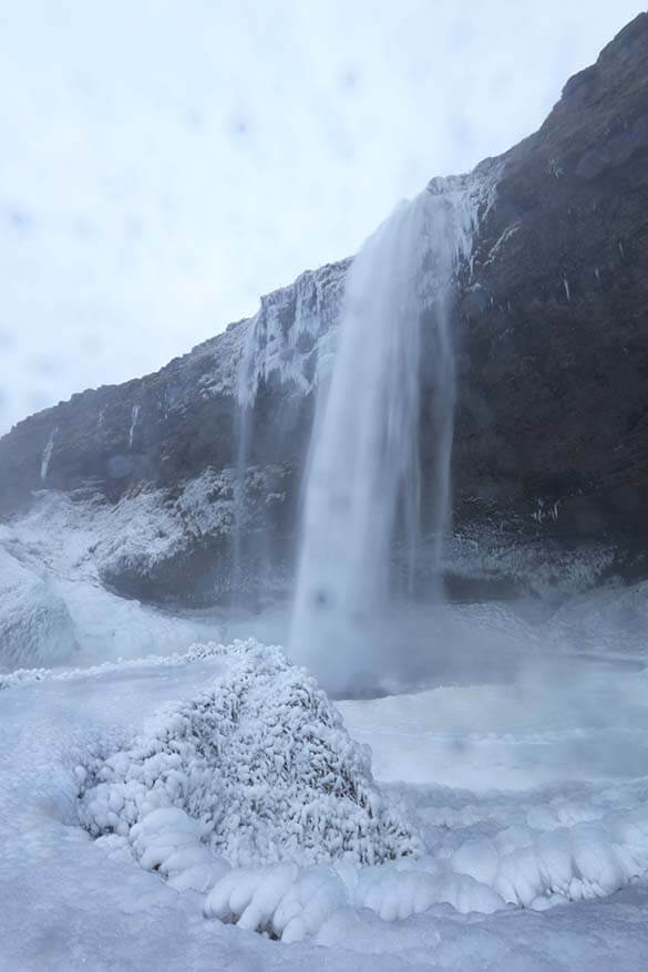 Frozen Seljalandsfoss waterfall in Iceland in winter