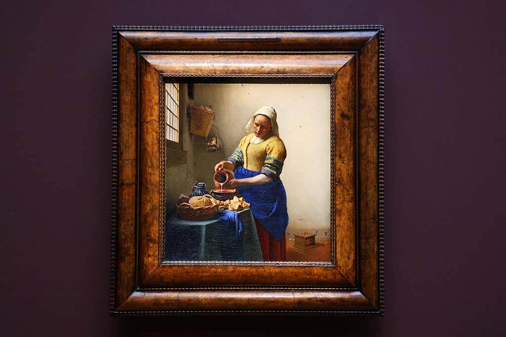 Johannes Vermeer painting 'The Milkmaid' at the Rijksmuseum in Amsterdam