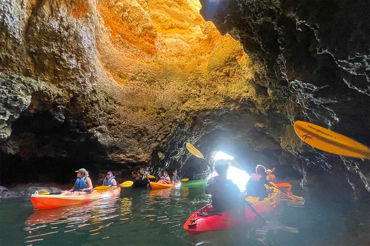 Kayaking inside sea caves in Algarve