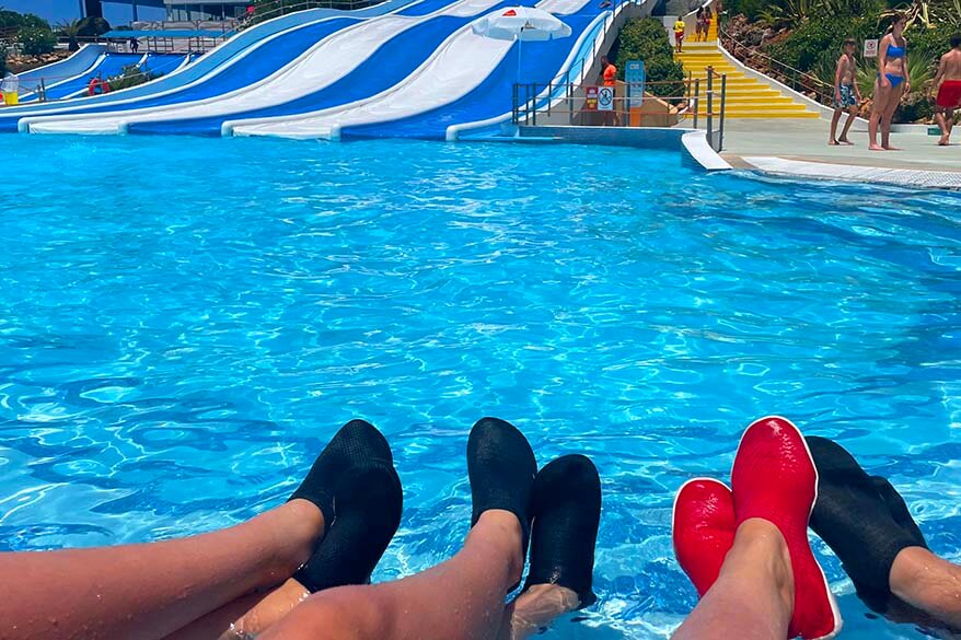 Family wearing water shoes at a water park in Portugal