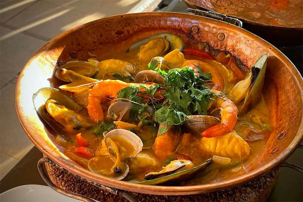 Monkfish and seafood cataplana at O Lusitano Restaurant in Albufeira Algarve Portugal