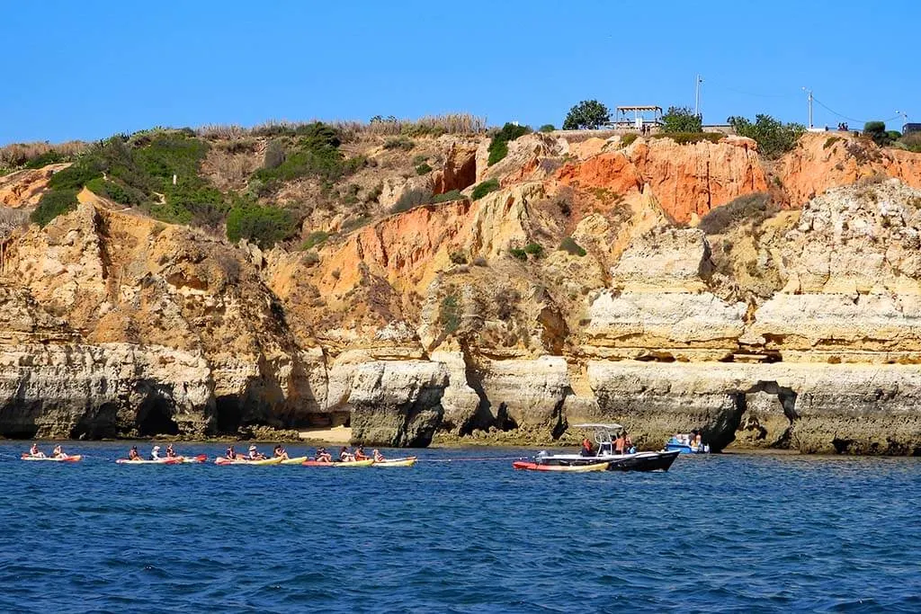 Motorboat towing kayaks in Lagos - Ponta da Piedade kayak tour