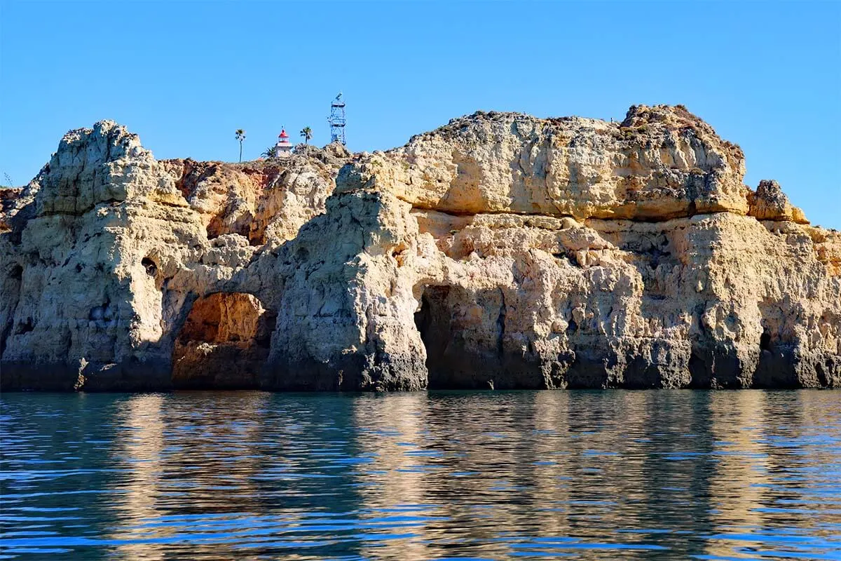 Ponta da Piedade coastline and lighthouse as seen from a boat tour