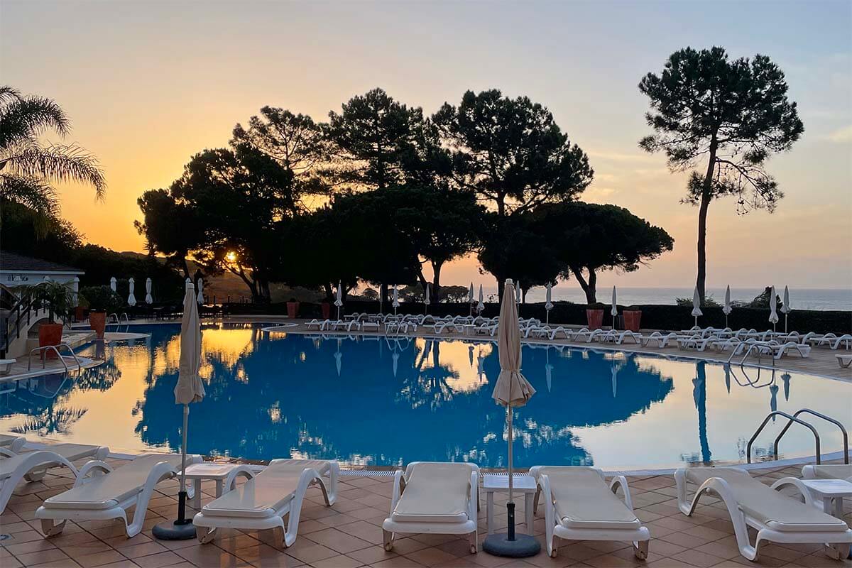 Hotel pool at sunset - Porto Bay Falesia Hotel in Albufeira