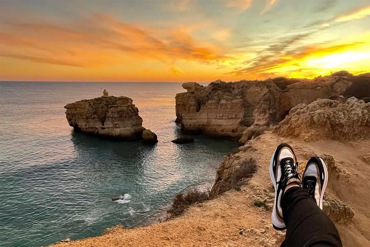 Traveling in Algarve in the low season - enjoying a beautiful sunset near Sao Rafael Beach