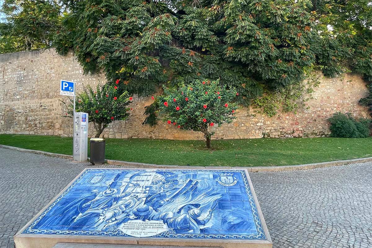 Faro city walls and azulejo panels depicting historic scenes - Faro Portugal