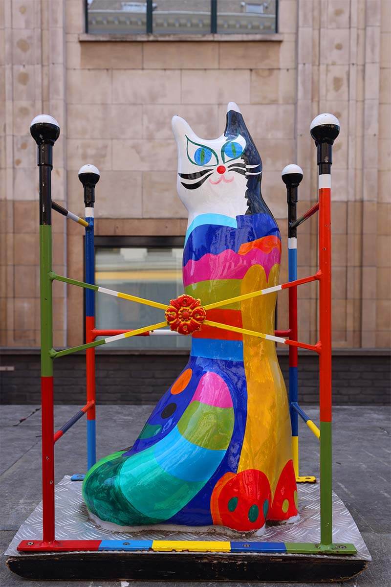 Modern colorful cat sculpture in Antwerp old town