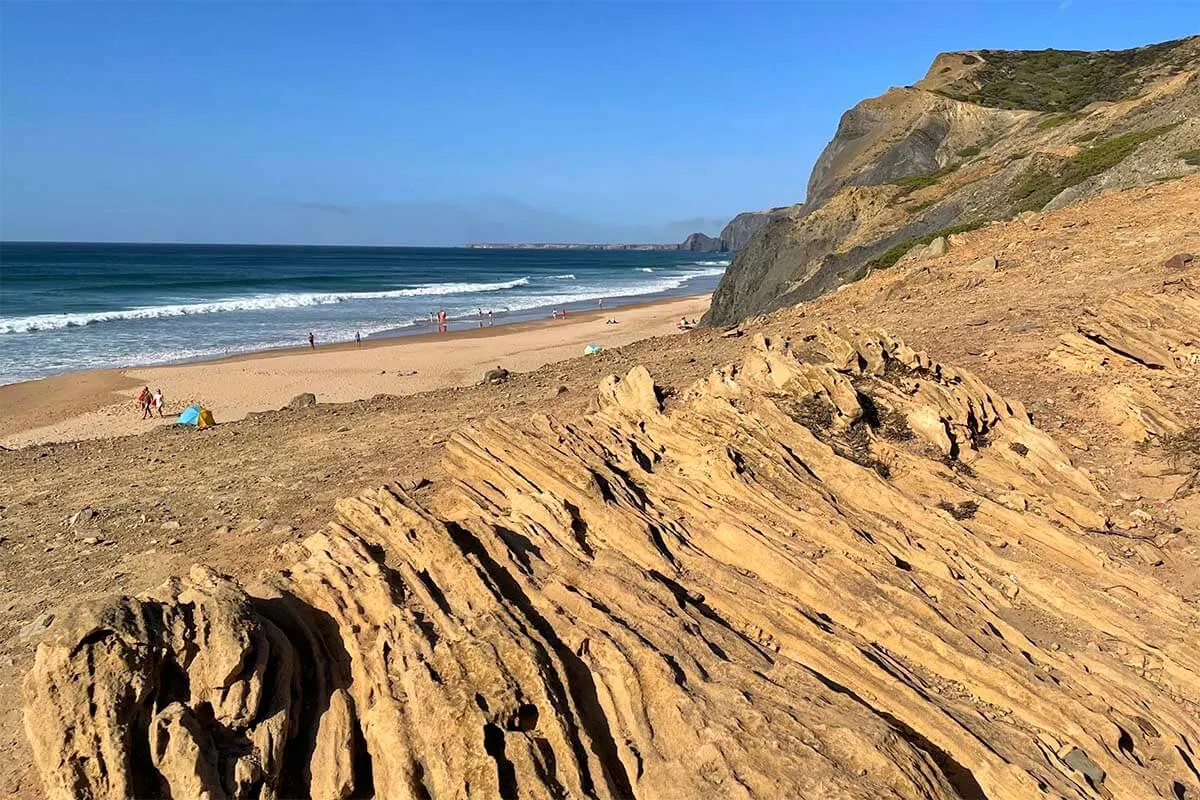 Unique rock formations on Praia da Cordoama beach in Portugal
