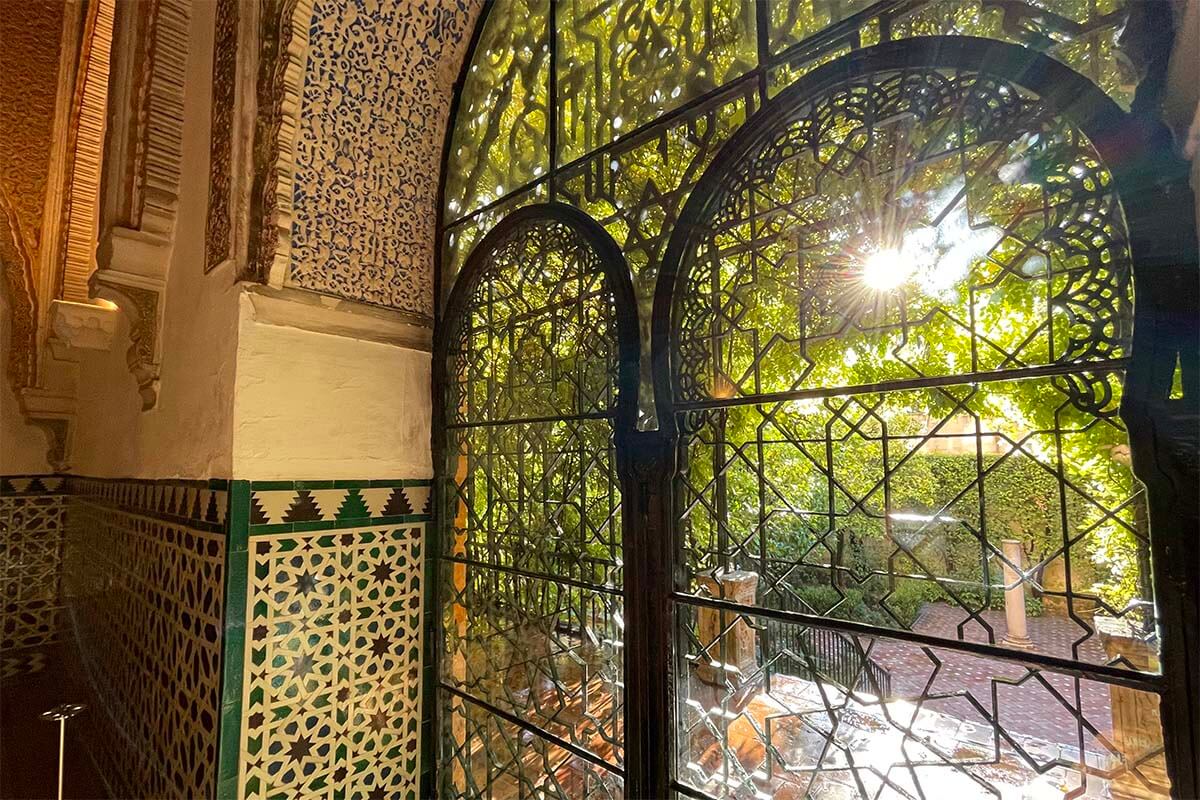 The Royal Alcazar of Seville (Real Alcazar de Sevilla) architecture detail and sun rays