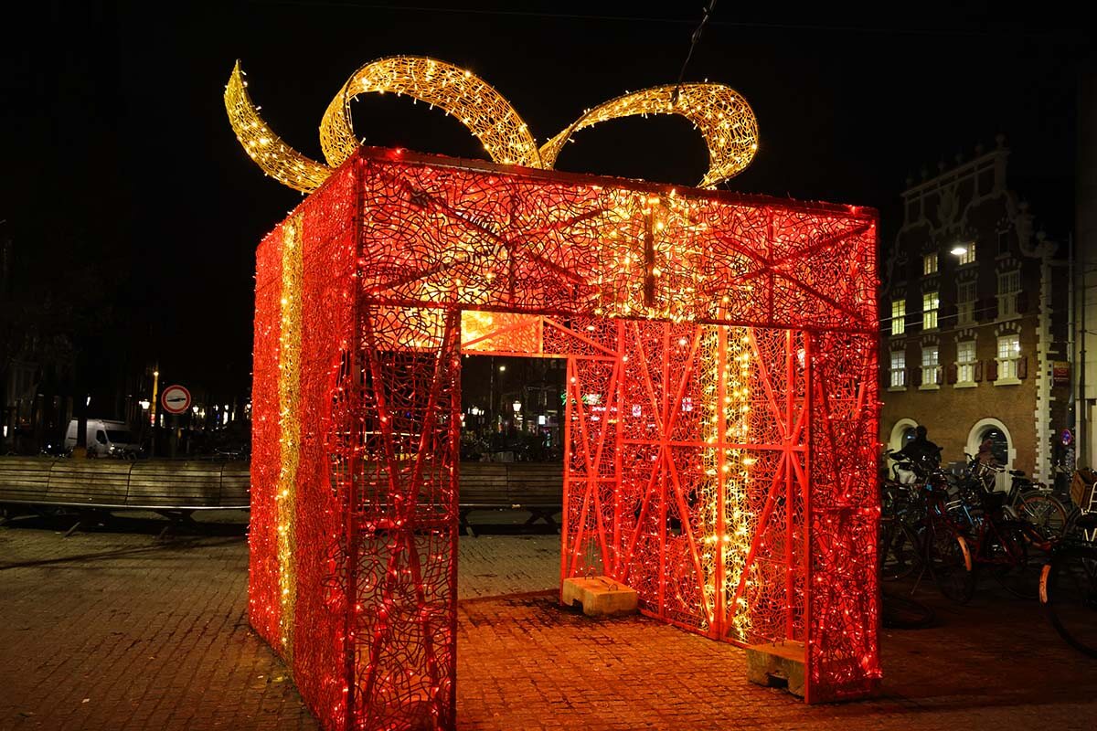 Christmas in Amsterdam - big red gift box at Amsterdam canals