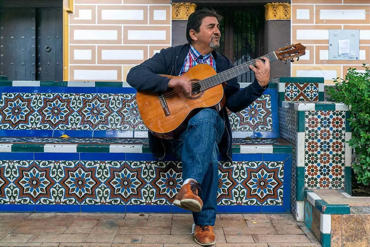 Flamenco guitar player on the streets of Seville Spain