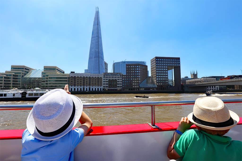 Kids enjoying the views on the Thames River Cruise in London