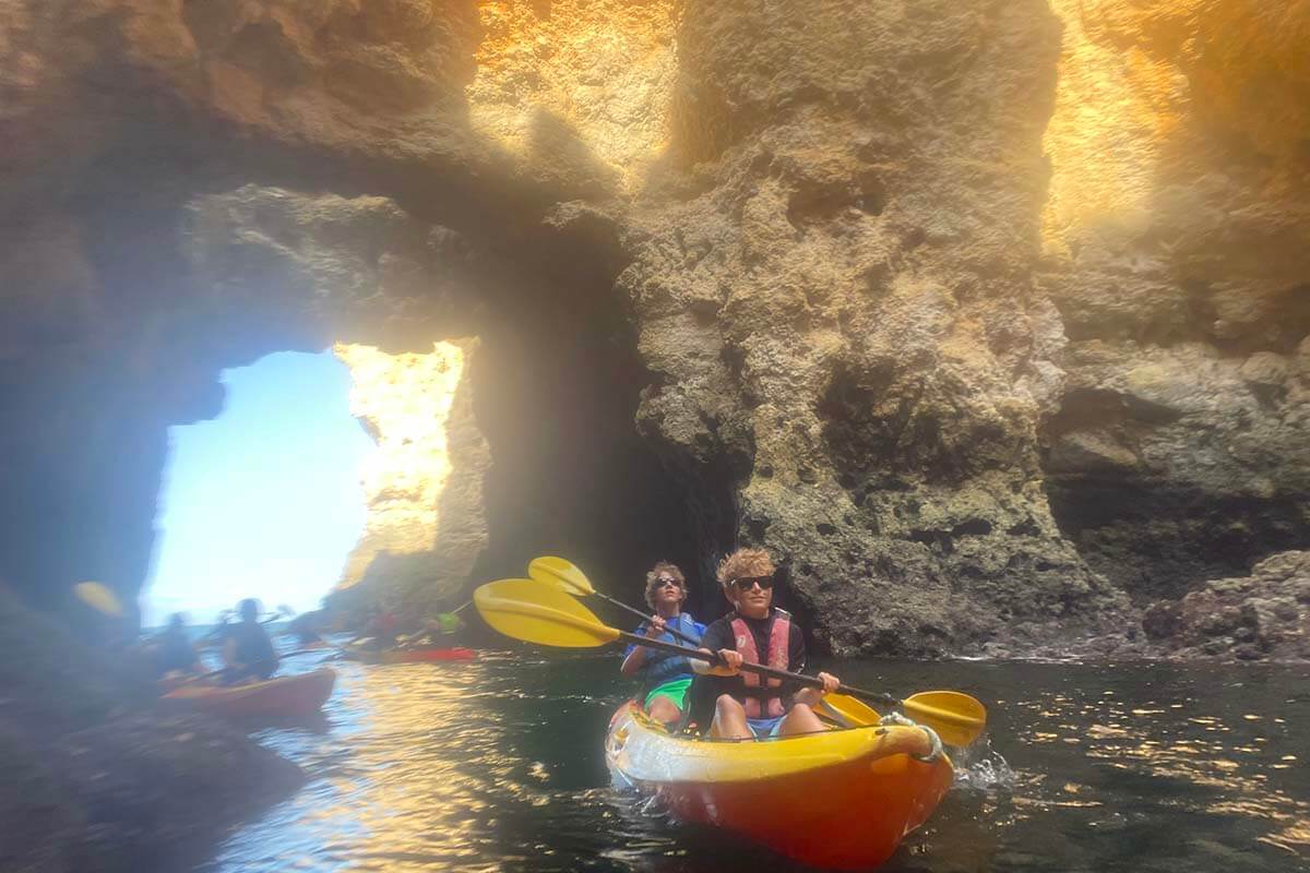 Kayaking along the Algarve coastline in Portugal