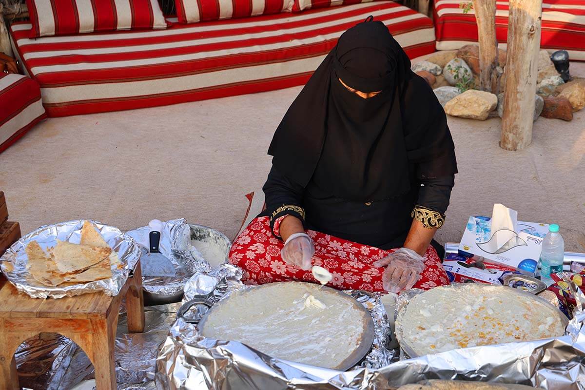 Emirati woman baking traditional bread in Dubai