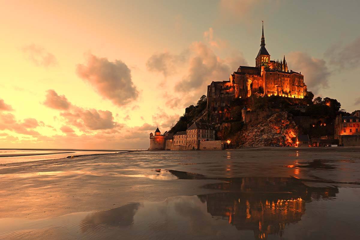 Mont Saint Michel at sunset - fairytale destinations in Europe