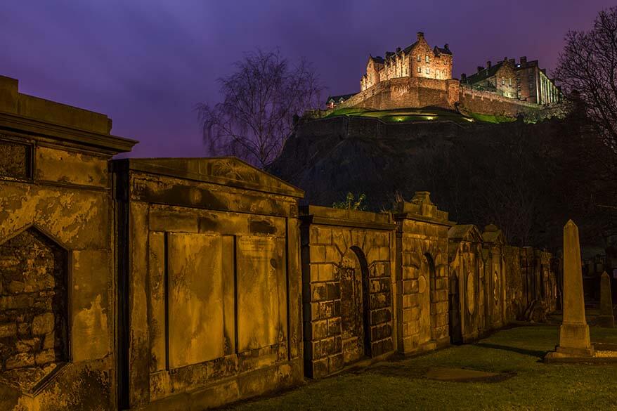 Edinburgh Castle and graveyard in the dark