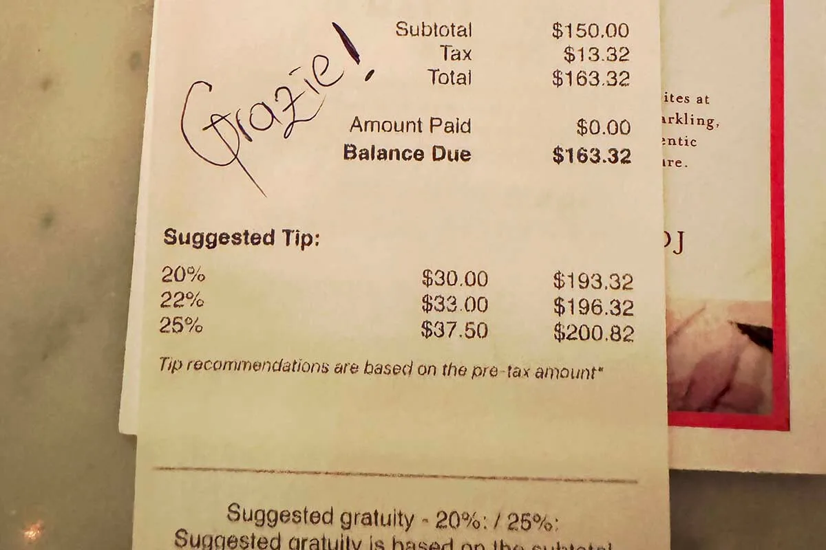 Restaurant bill in the USA with sales tax and suggested tips