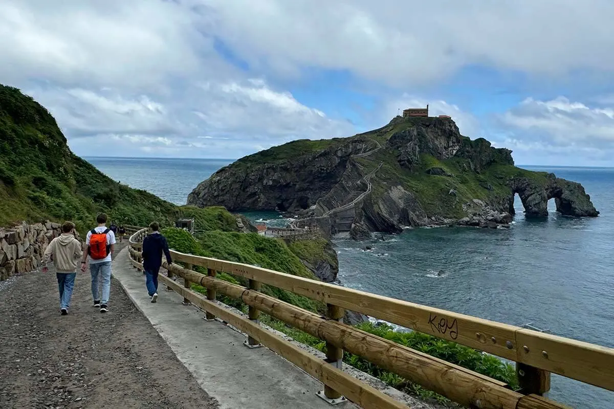 People hiking to Gaztelugatxe