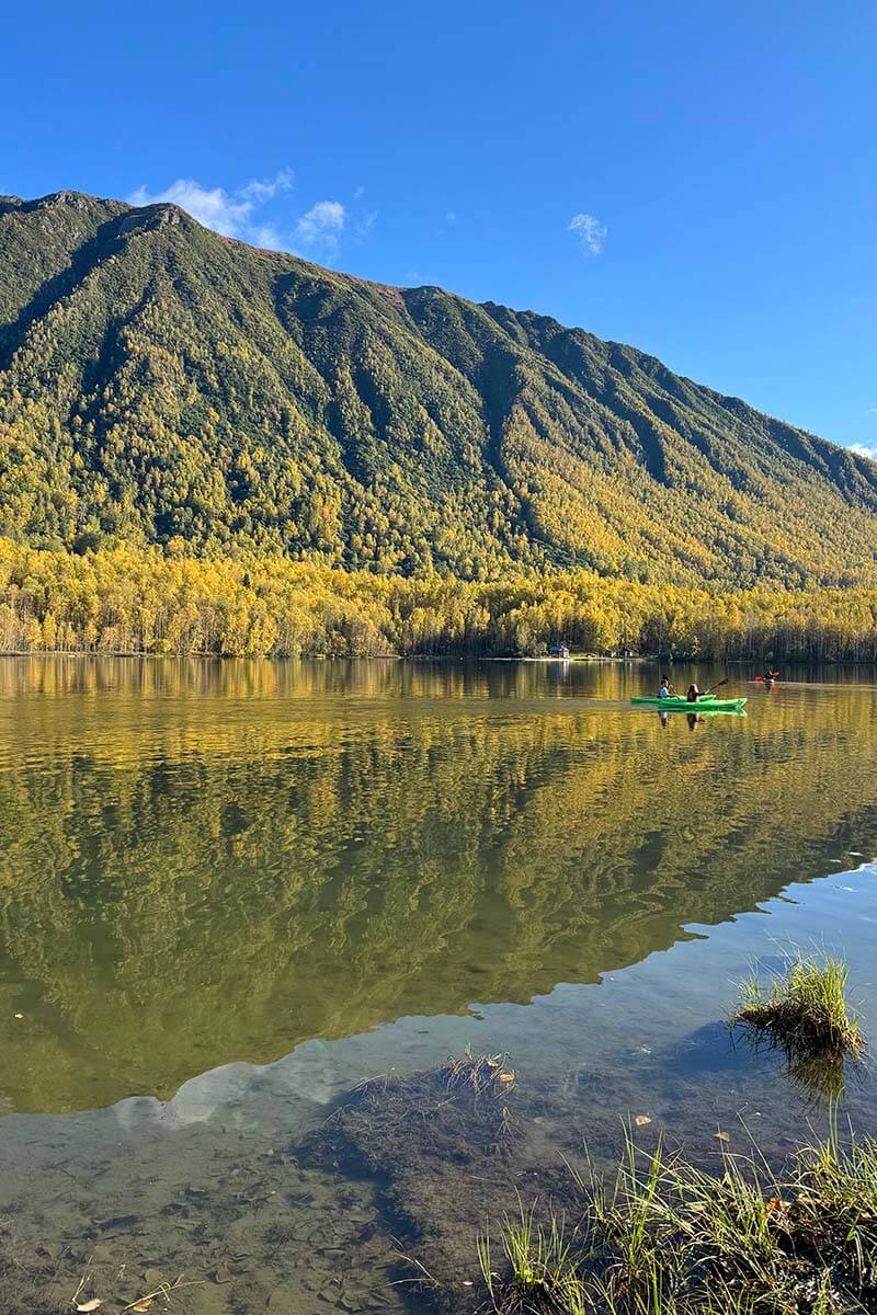 People kayaking on Mirror Lake near Palmer in Alaska in September