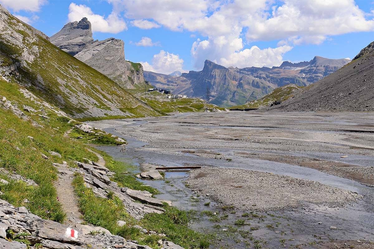 Alpine hiking trail near a glacier river at Lammerenboden, Gemmiweg, Switzerland