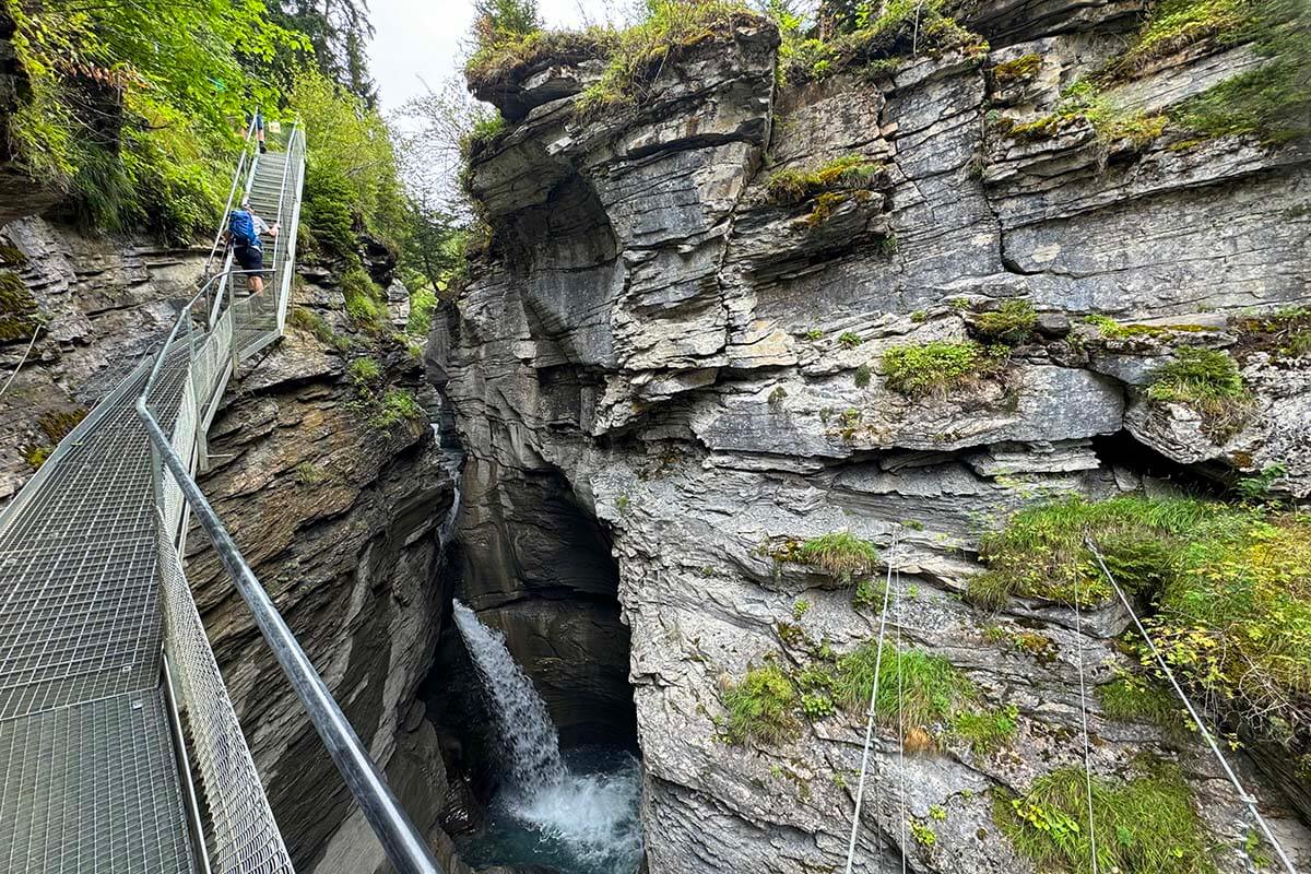 Thermal Springs Way and Dala Gorge waterfall in Leukerbad Switzerland