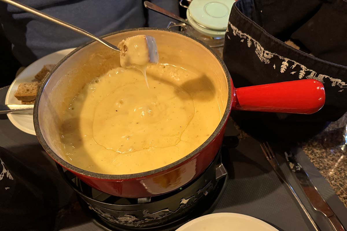 Traditional Swiss cheese fondue at a restaurant in Leukerbad