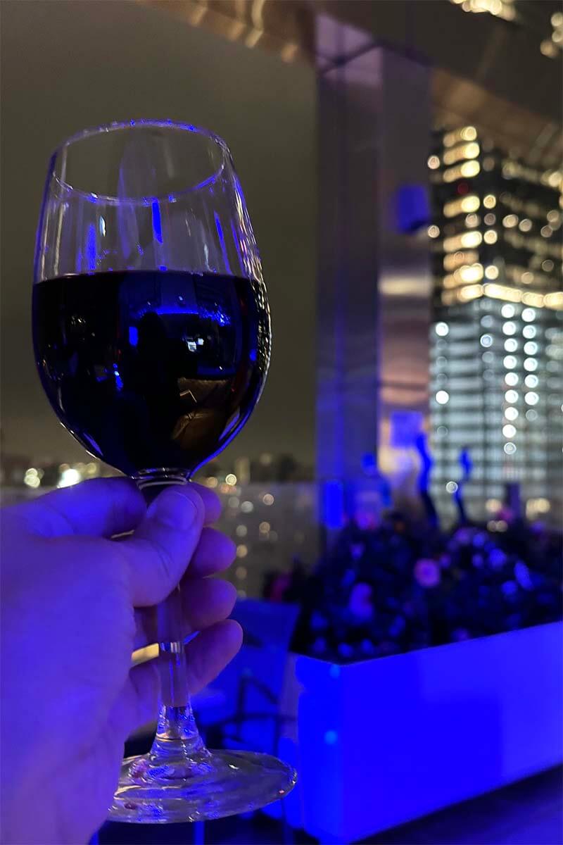 Glass of wine at a rooftop bar in New York City