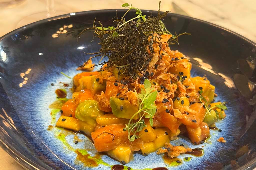 Salmon salad at Achado by Petrunyak restaurant in Albufeira