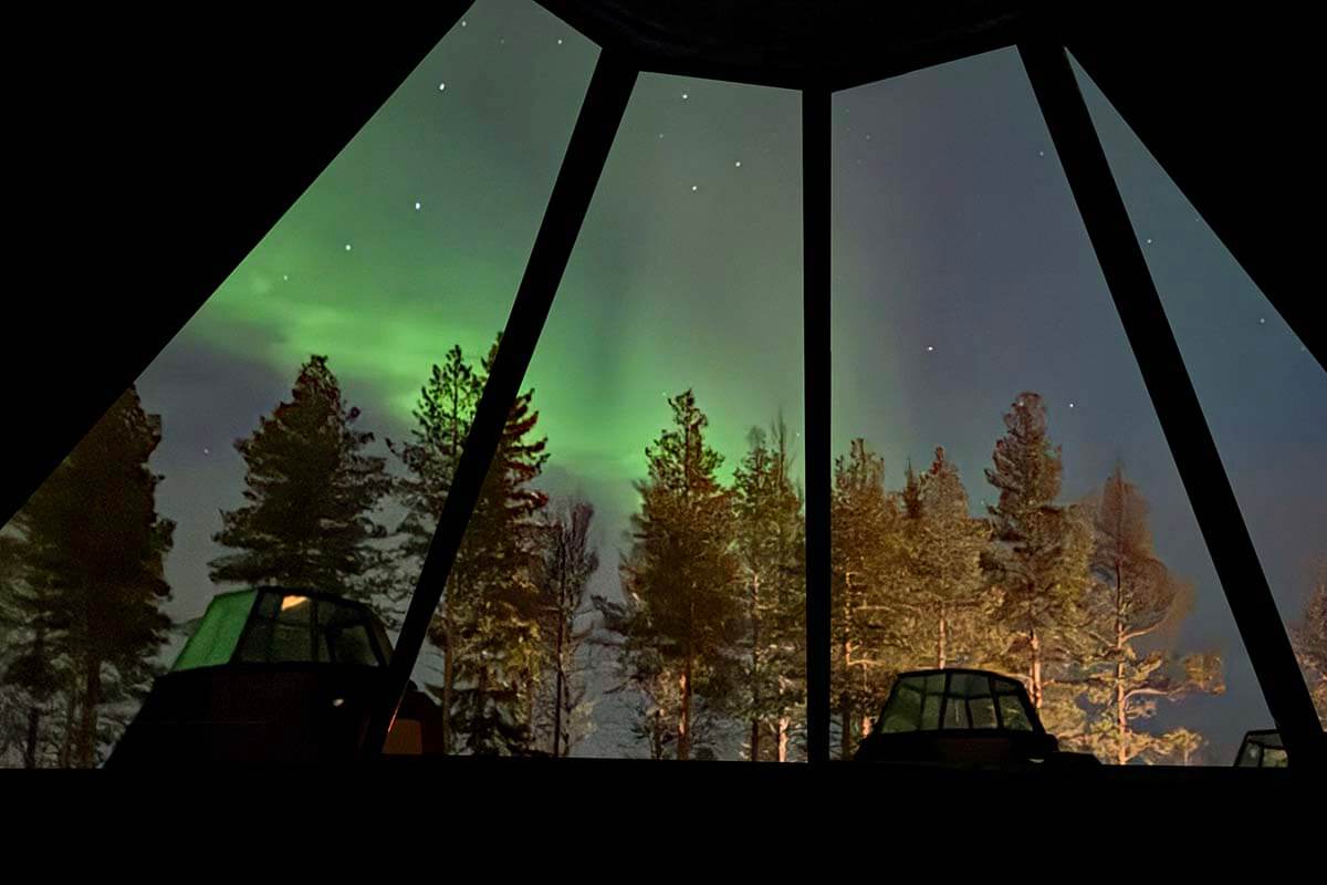 Aurora as seen from a glass igloo in Finnish Lapland - one of the best destinations to see northern lights in the world