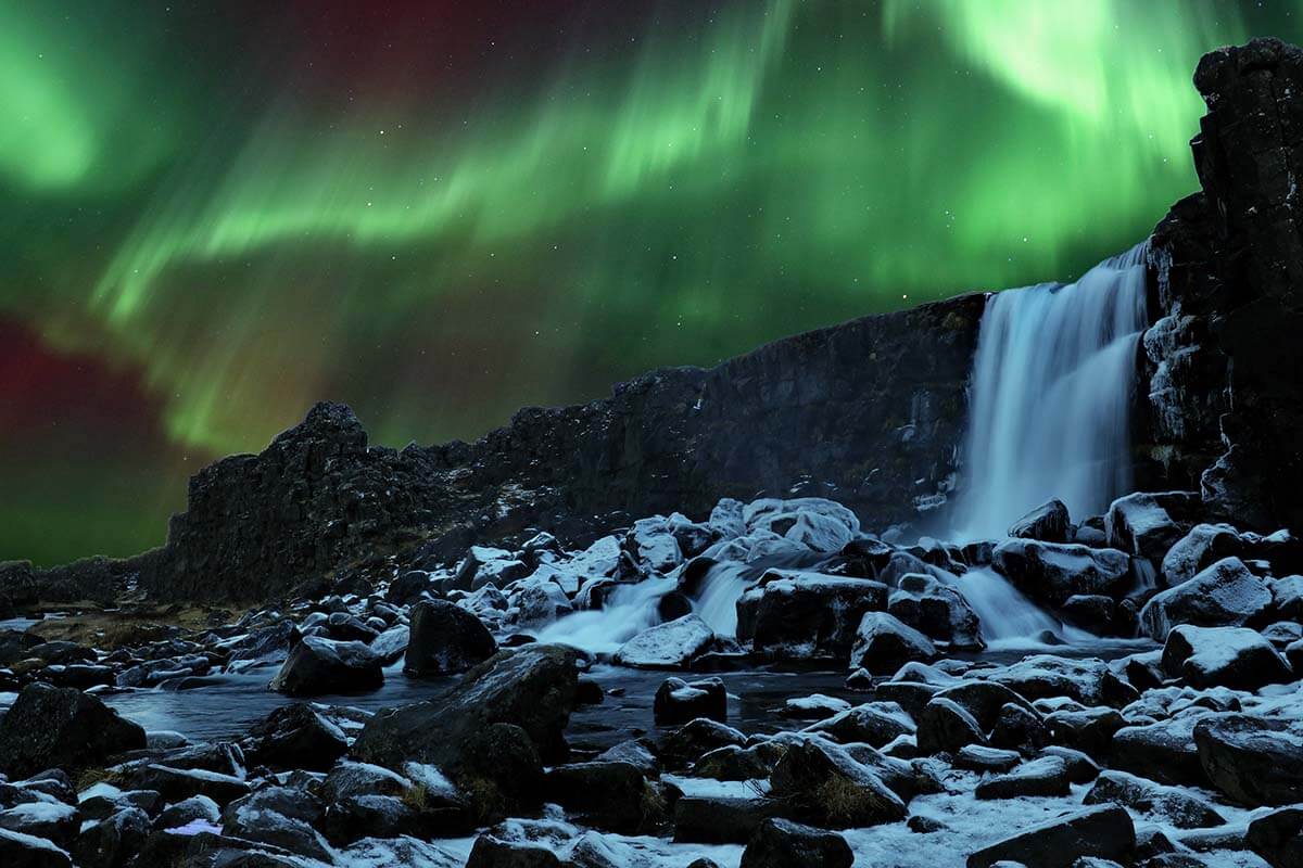 Northern lights in Iceland at Oxararfoss waterfall