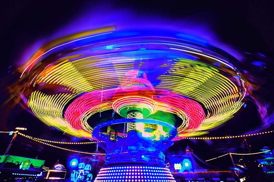 Colorful merry-go-round at Global Village in Dubai at night