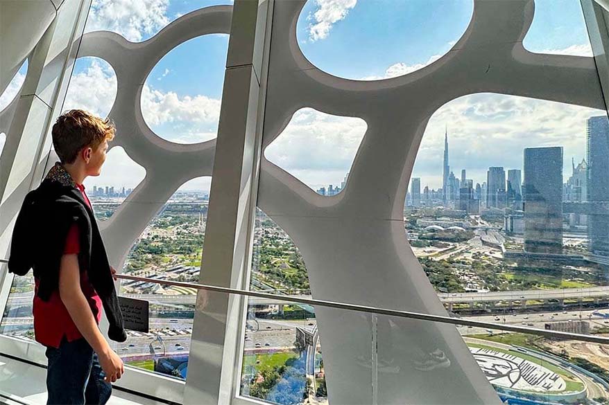 Kid enjoying the views from Dubai Frame