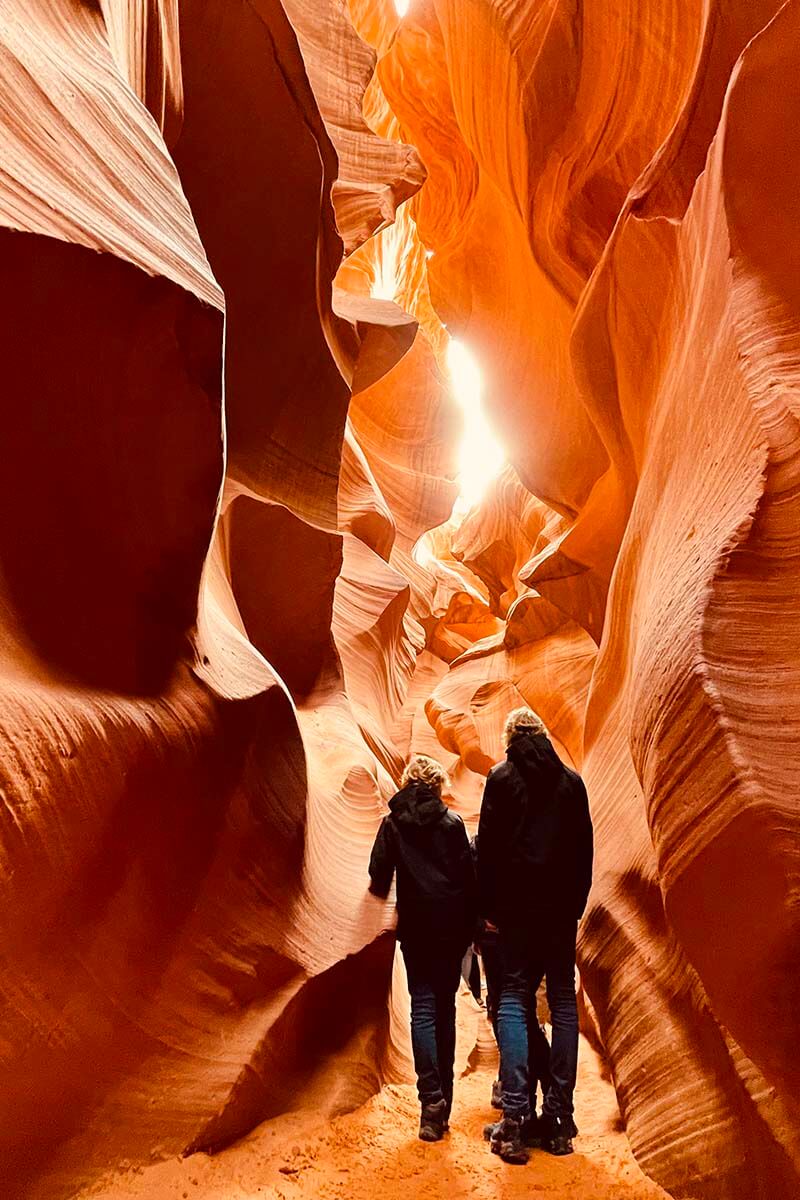 Teenagers walking inside Antlope Canyon in Page, Arizona