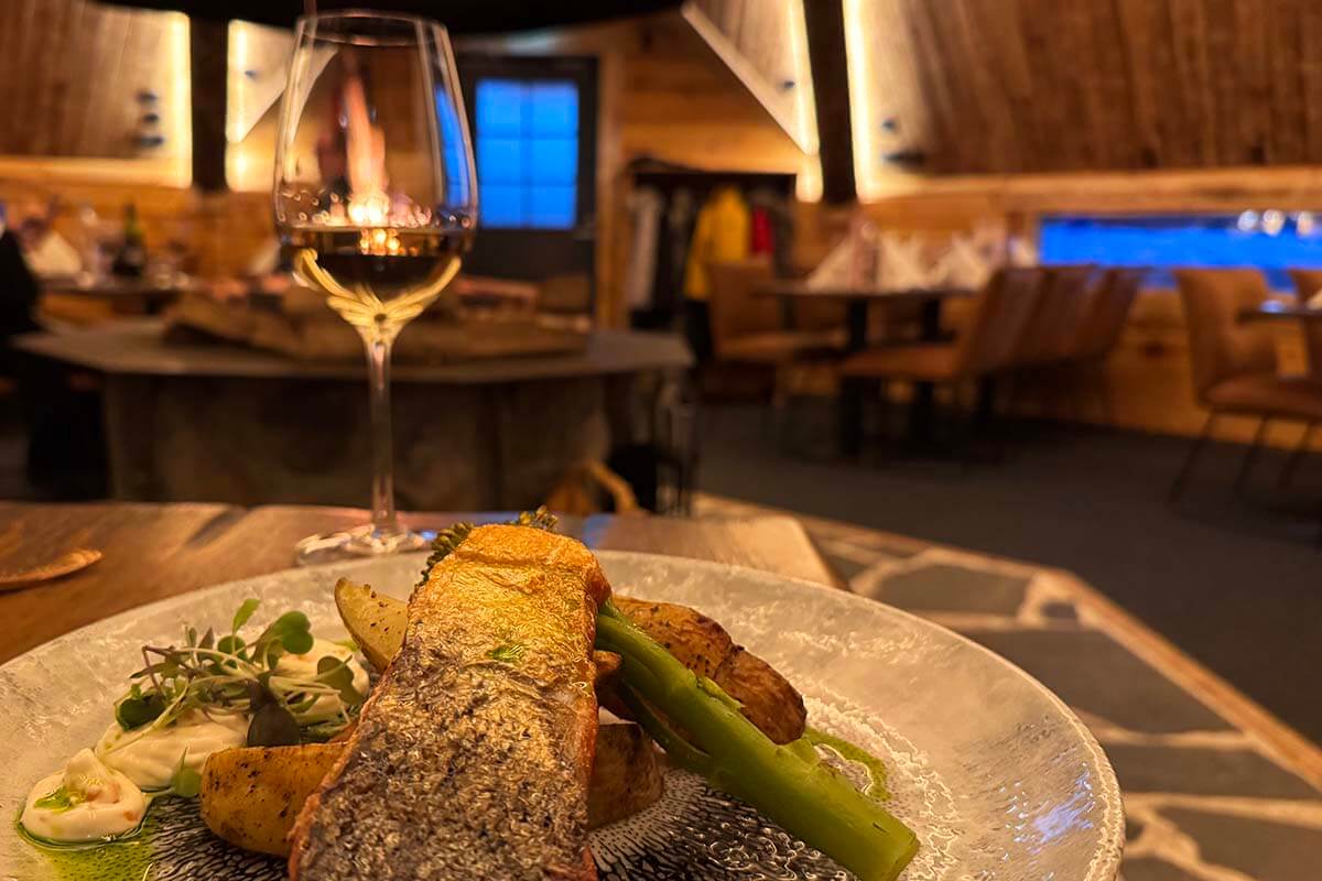 Gourmet salmon meal at a traditional kota restaurant in Lapland Finland