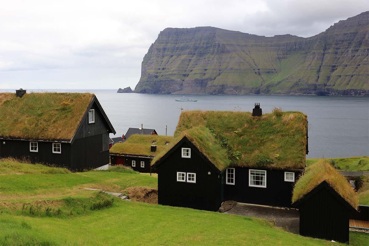 Turf houses along the fjord in the Faroe Islands