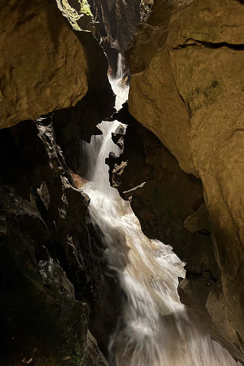 Underground waterfall inside the mountain at St Beatus Caves in Switzerland