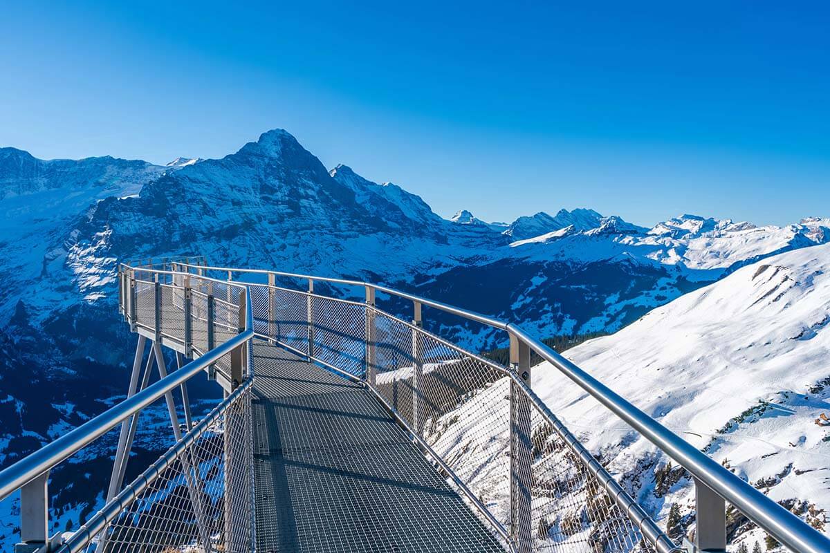 Grindelwald First in winter - First View metal bridge and mountain scenery