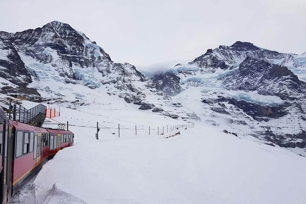 Jungfraujoch railway in the snow - top day trip from Interlaken in winter