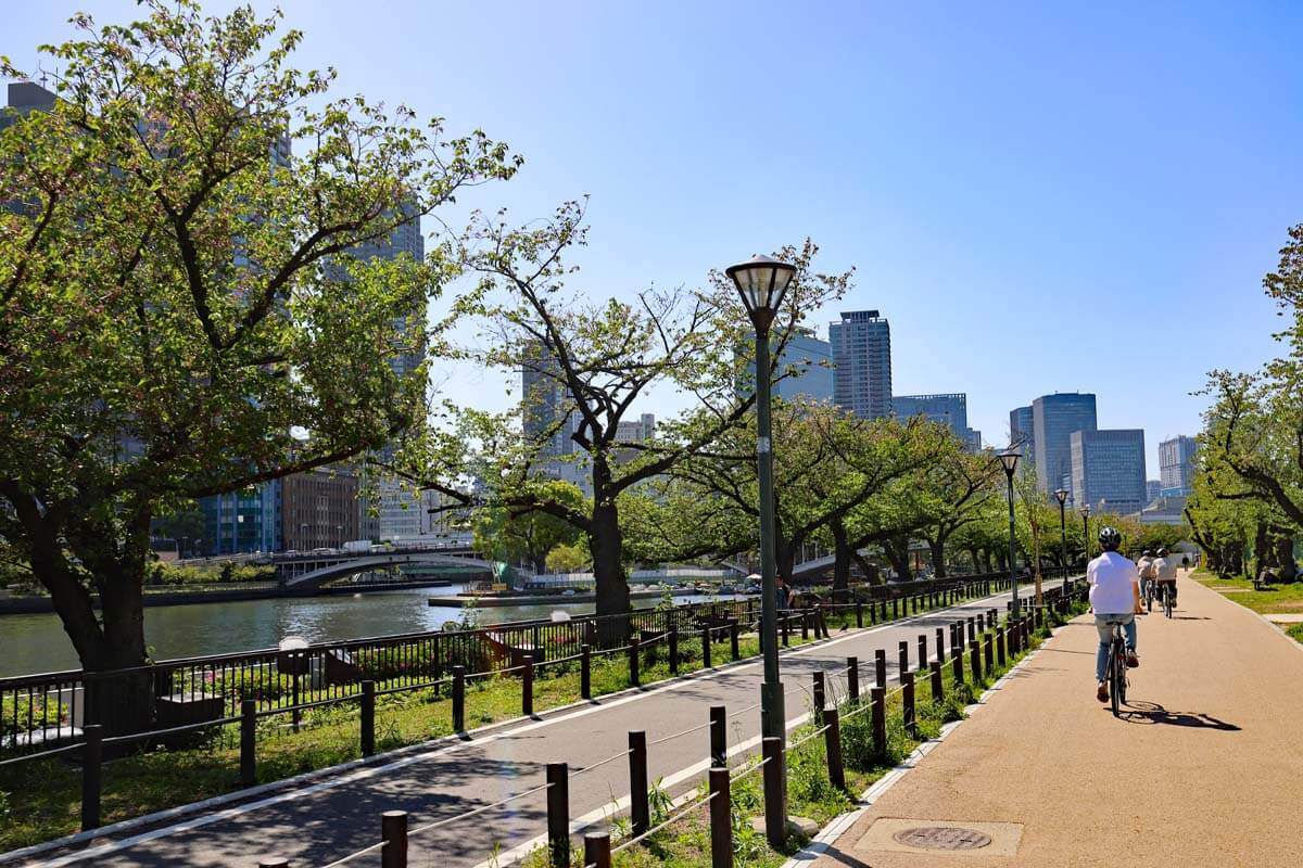 Biking by the riverside in Osaka Japan