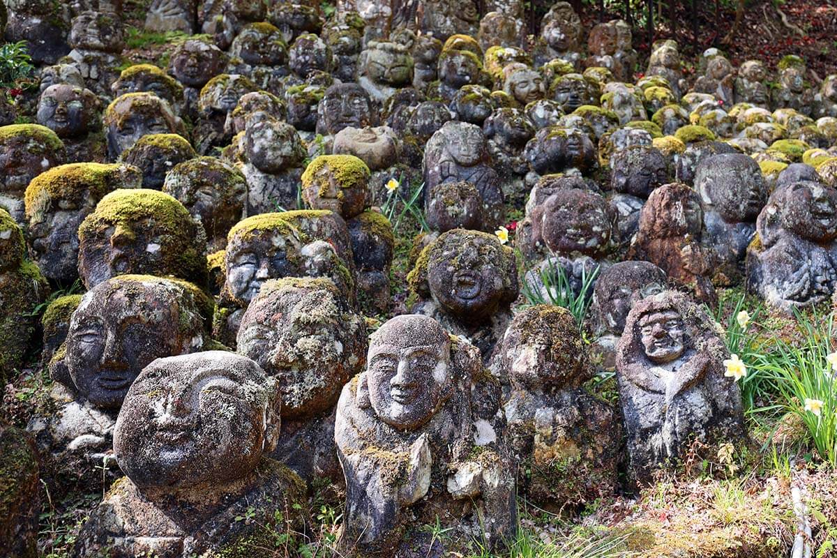 Stone heads sculptures at Otagi Nenbutsu-ji temple in Kyoto Japan