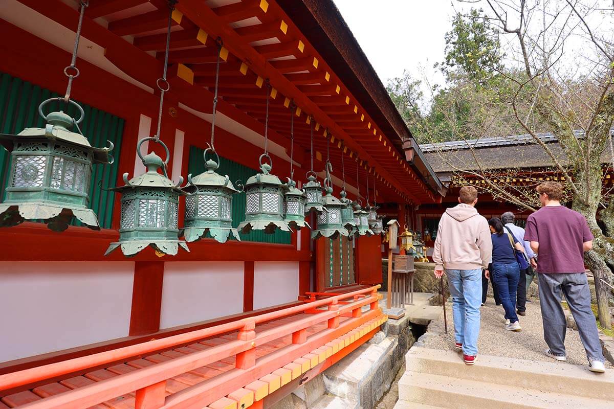 Teens at Kasuga Taisha Shinto Lantern Shrine in Nara Japan
