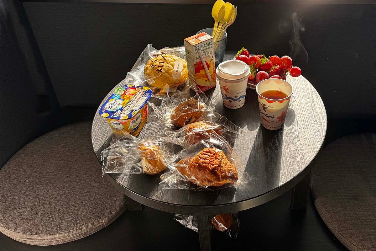Tiny Japanese table with breakfast items all packaged in plastic