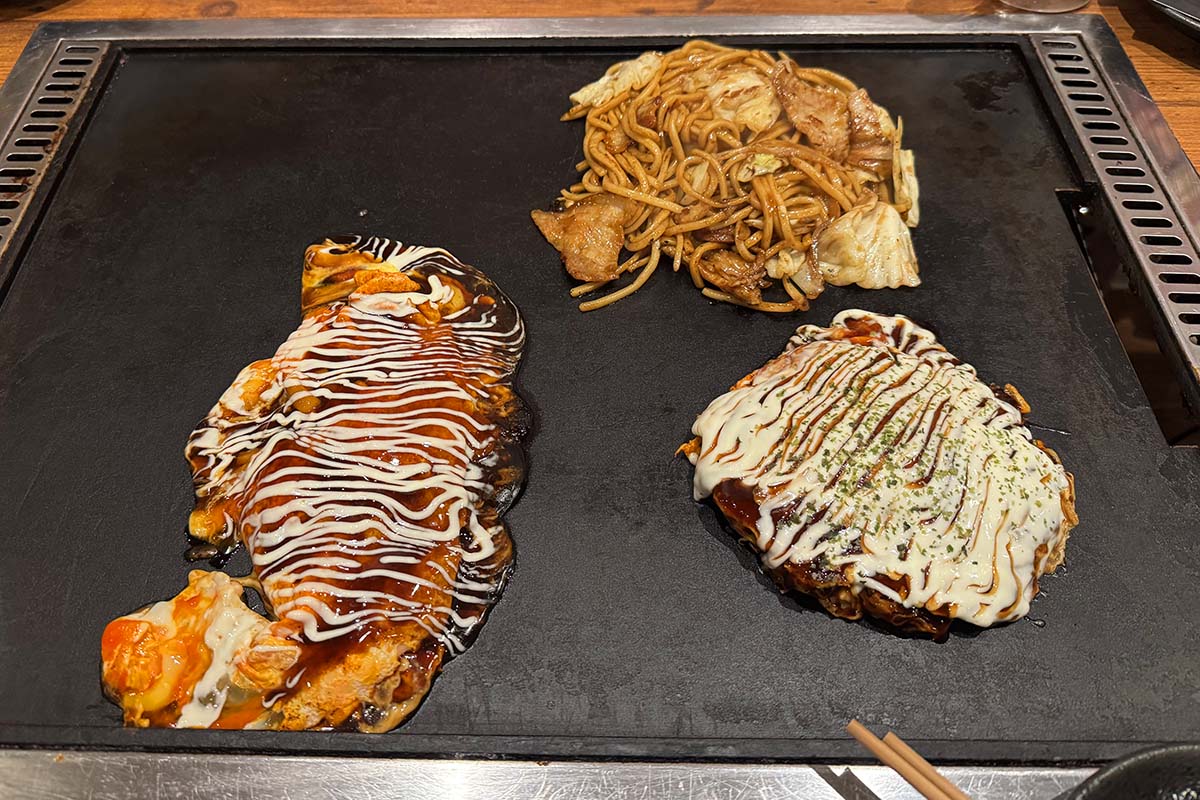 Traditional Okonomiyaki savory pancakes in Osaka Japan