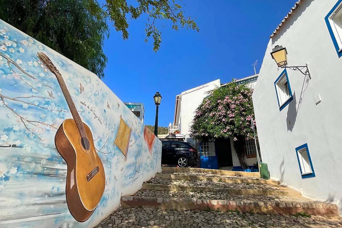 Colorful murals and typical Portuguese architecture in Alte village in Algarve in August
